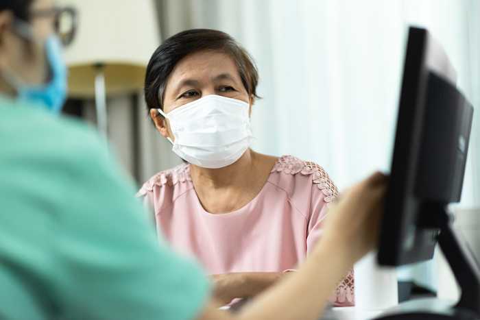 Asian Patient Masked with Doctor